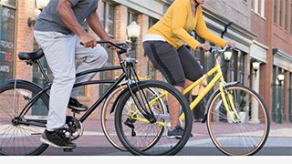 Picture of two people on bicycles