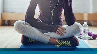 Picture of Woman on Yoga Mat Exercising