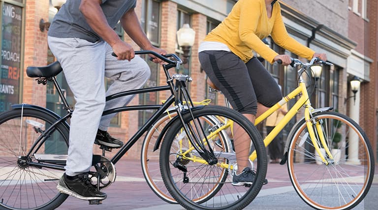 Picture of two people on bicycles